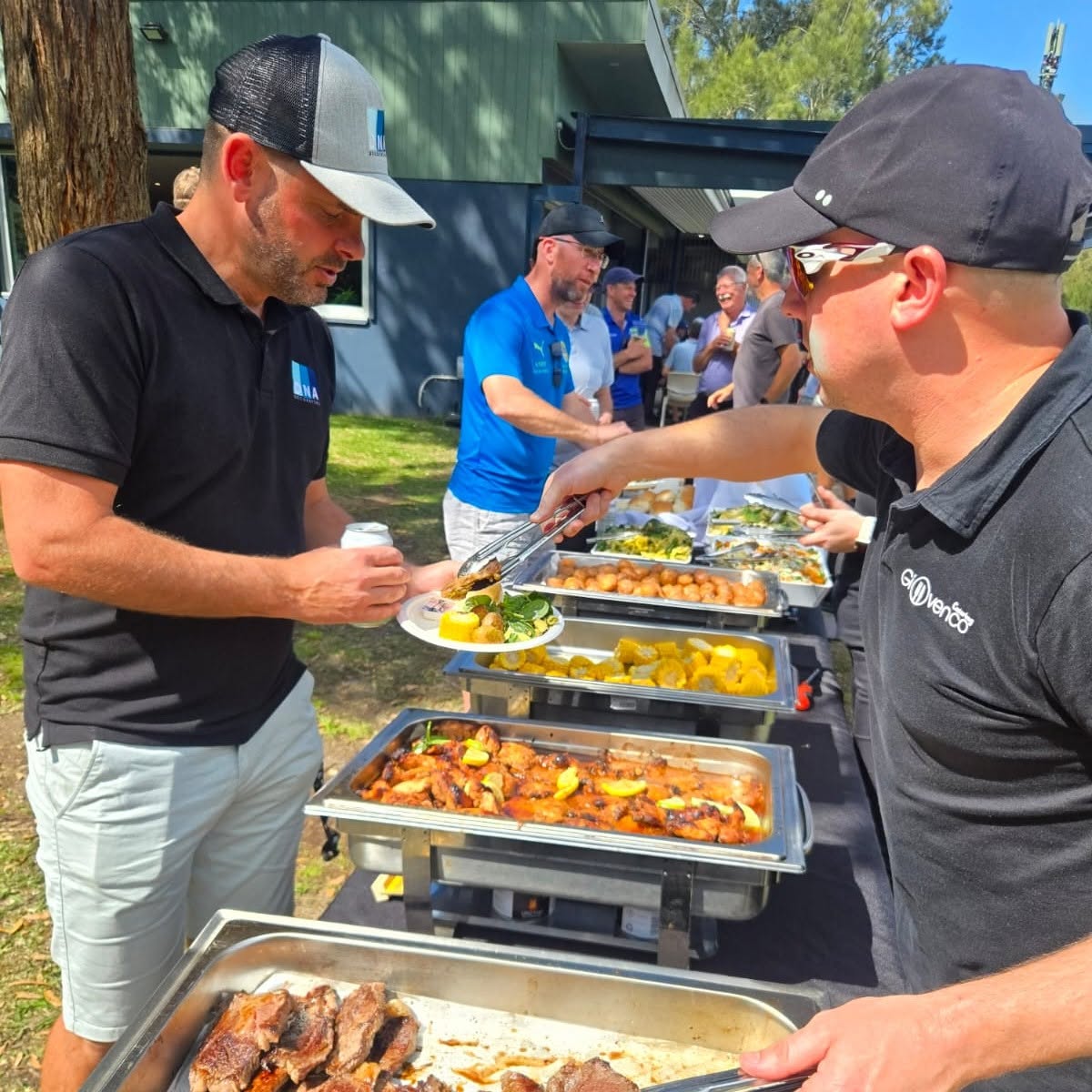 Bonnet Bay FC members enjoying a catered lunch feast after the golf